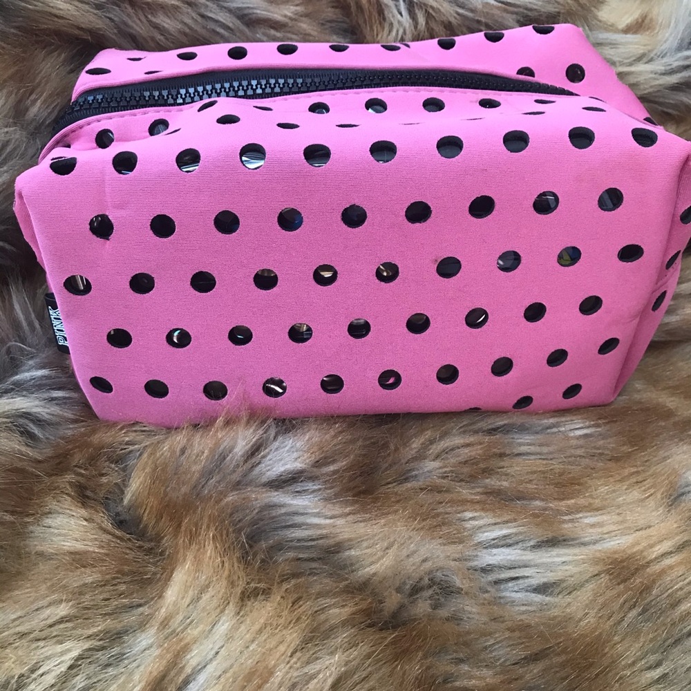 Pink Victoria’s Secret cosmetic travel bag